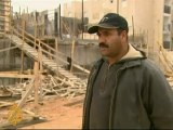 Palestinians build Israeli homes