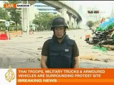 Thai troops breach red shirts' barricades