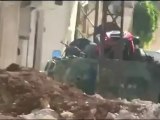 Syria فري برس حماة  المحتلة كفرزيتا إحدى المدرعات التي تساهم بنقل المسروقات 6 6 2012 Hama