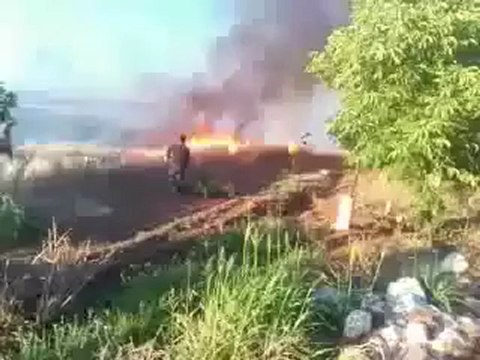 Syria فري برس حماة المحتلة كفرزيتا إحراق محاصيل زراعية 6 6 2012 Hama