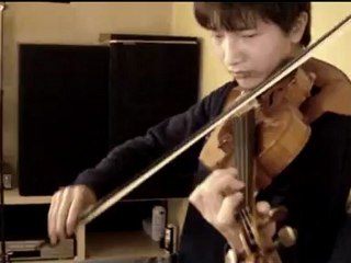The guitar boy plays the violin. He tried　FUGA by J.S.BACH