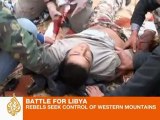 Libyan rebels continue fight for border crossing