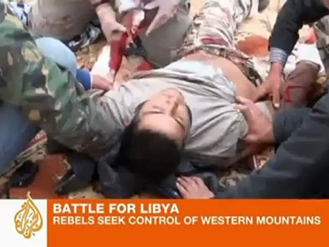 Libyan rebels continue fight for border crossing