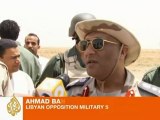 Libyan rebels under attack outside Brega