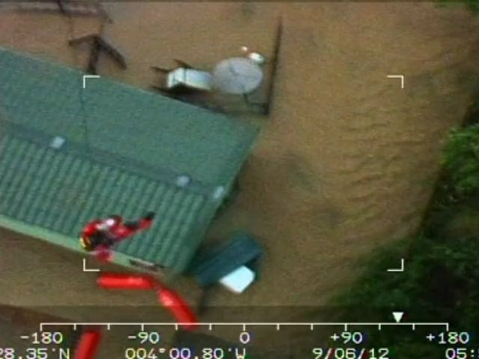 Dramatic helicopter footage shows Welsh flood r...