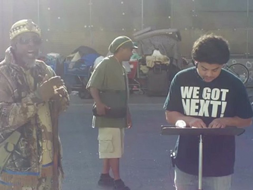PRIEST THAAHWAM AND ERWIN ON SKID ROW FEEDING THE HOMELESS # 1