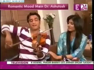 Dr.Ashutosh plays violin for Nidhi