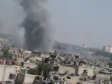 Syria فري برس هاااااااام لحظة سقوط قذيفة في حي الخالدية 10 6 2012 Homs