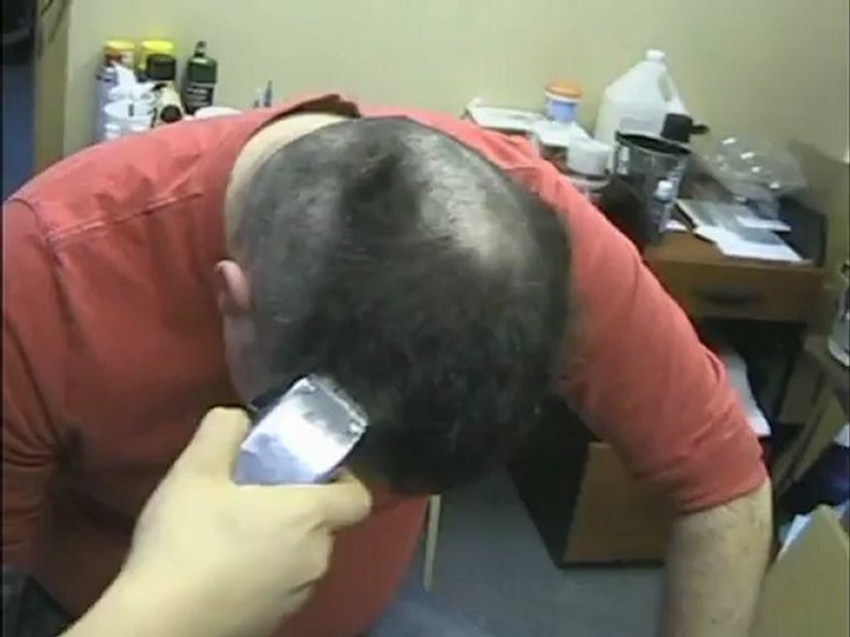 Mike shaves his head