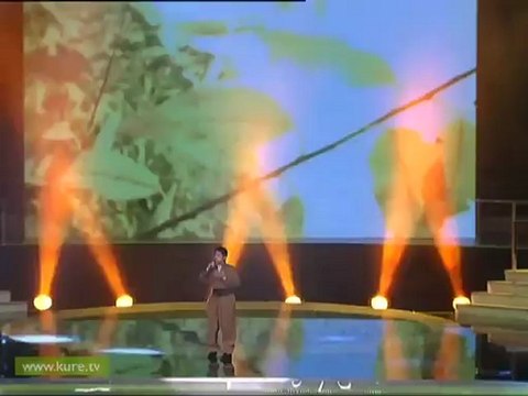 7 Eşarbını yan bağlama Irak ÖDÜL TÖRENİ 10.Türkçe Olimpiyatı