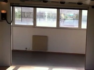 Porte de garage euroulable Lakal posée par APG Accès Portes de Garage