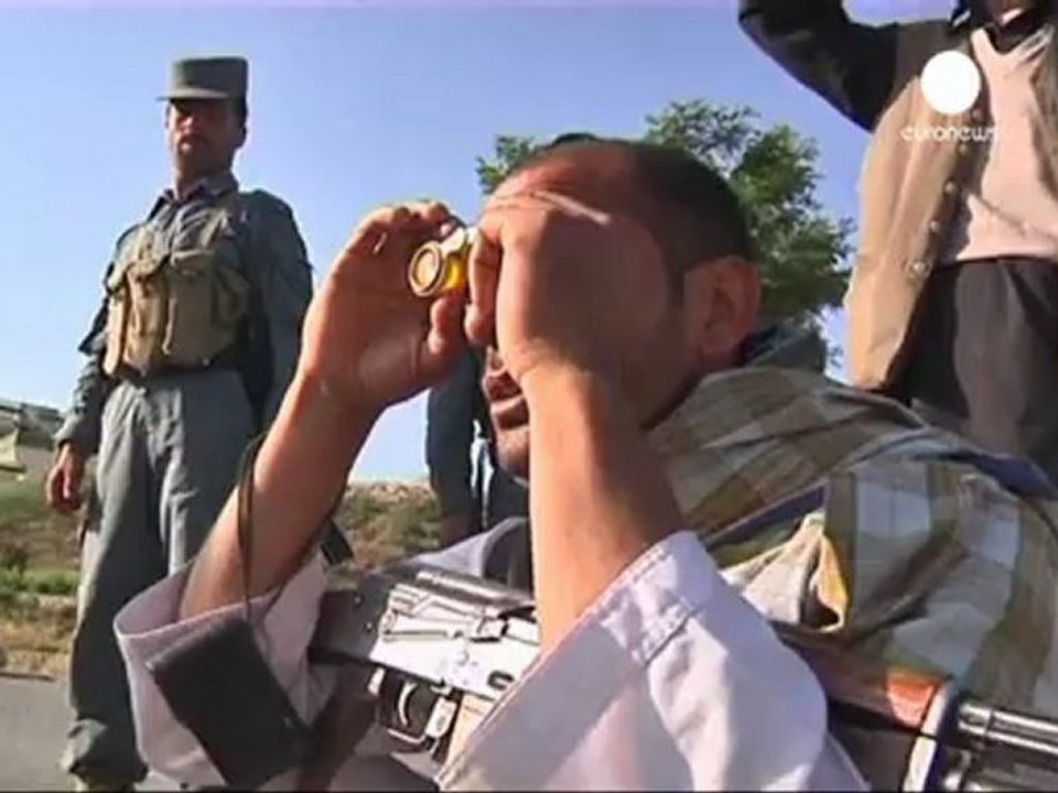 Dozens killed in Taliban attack on lakeside hotel