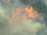 Thirty-two thousand evacuated as Colorado wildfires spread