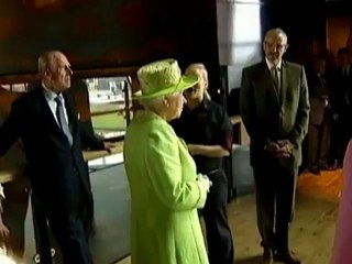 Queen visits Titanic exhibit following historic handshake