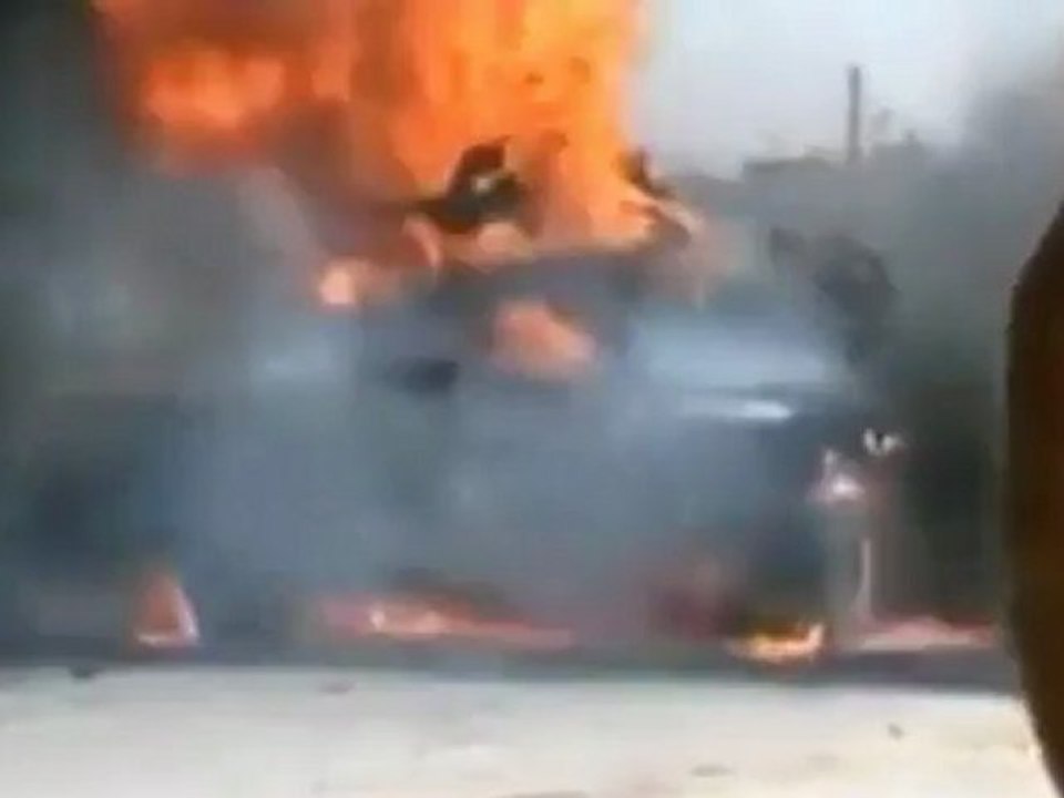 Syria rebels attack regime tank.