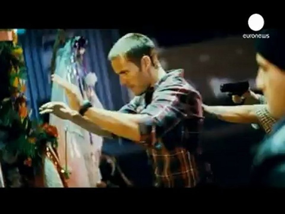 Travolta and Hayek star in Oliver Stone's Savages