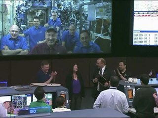 [ISS] Expedition 29 Traditional Mission Plaque Hanging in Flight Control Room