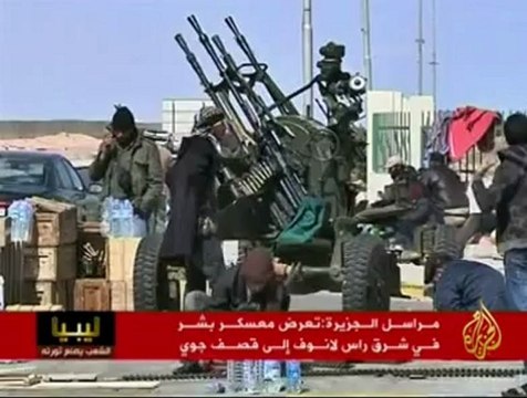 كتائب القذافي تقصف راس لانوف احد أهم موانئ النفط