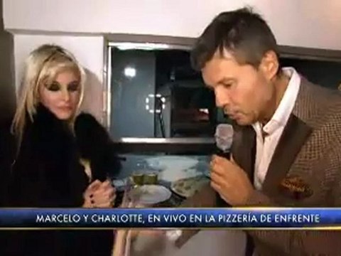 Tinelli y Charlotte comen pizza