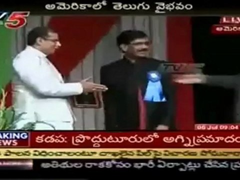 Minister Sridhar Babu presenting ATA Award to TeluguOne MD Ravi Shankar Kantamneni