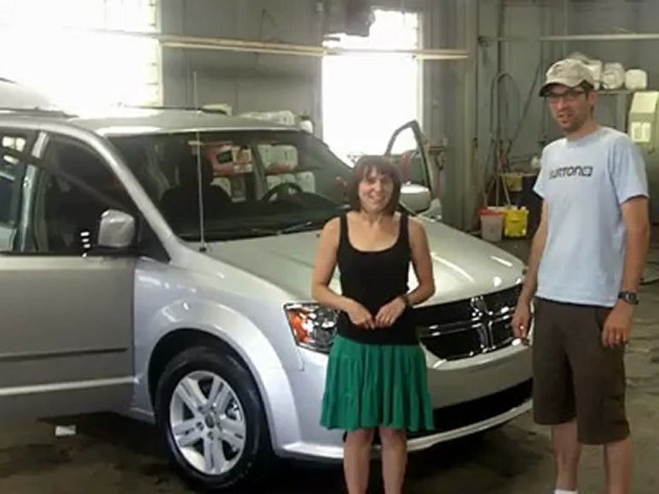 Happy Clients loving their new Dodge Grand Caravan Crew from Landry Auto Chrysler Laval