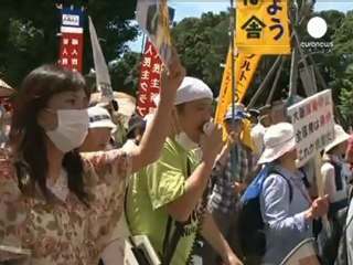 Huge anti-nuclear rally as Japan government restarts...