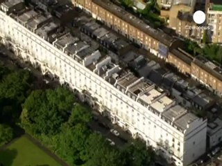 Billionaire charged with delaying the burial of his wife