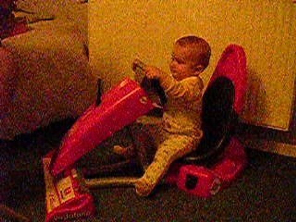 Enzo sur sa ferrari