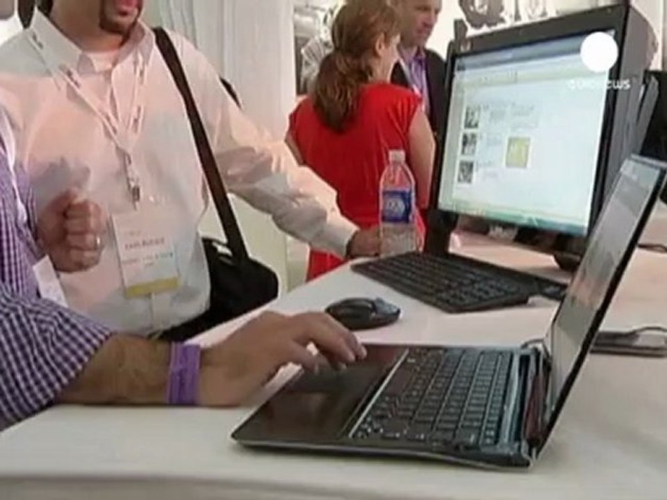Microsoft posts loss but upbeat on future products