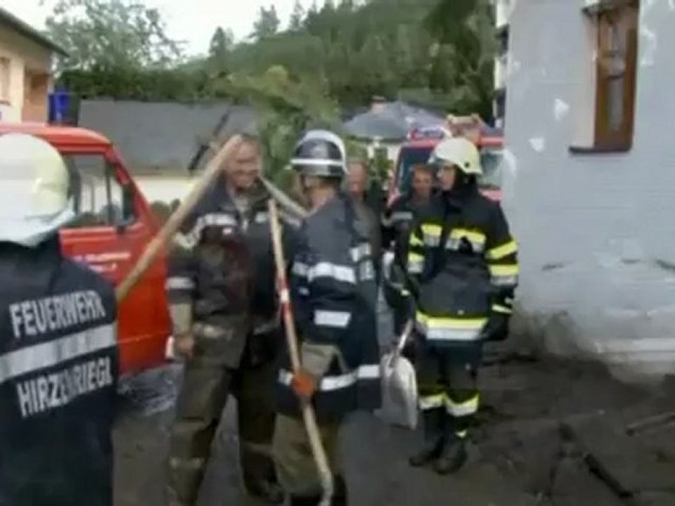 Austrian mudslides kill one, cut off villages