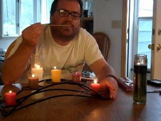 How to light a hard to reach candle wick