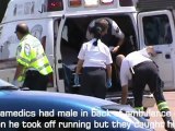 Police & Paramedics dealing with aggitated male with knife in ambulance