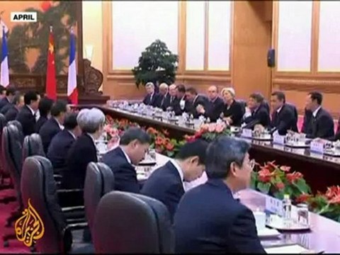 China offers to buy Greek debt
