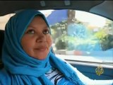تجربة سيدة مصرية في قيادة سيارة أجرة