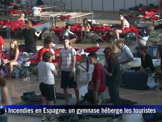 Incendies en Espagne: un gymnase héberge les touristes