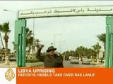 Libyan forces push rebels back