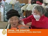 Japan engineers working to cool reactors
