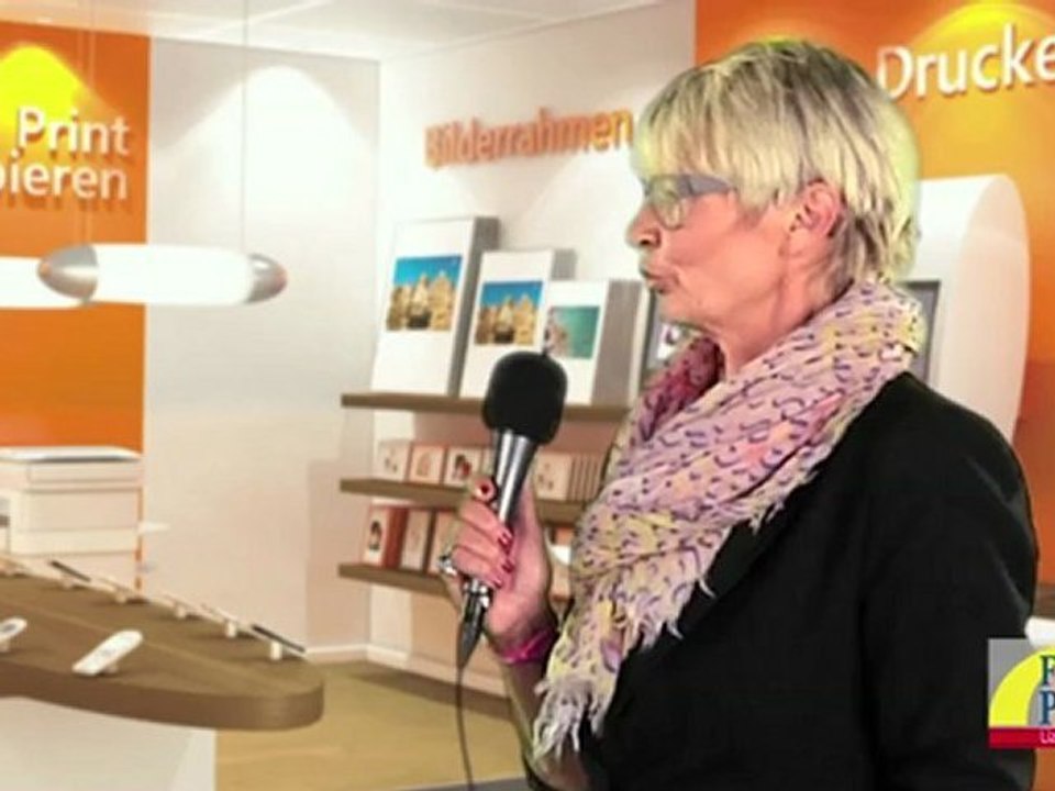 Telyps verknüpft Handyladen und Fotostudio