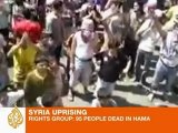 'Scores dead' as Syrian tanks storm Hama