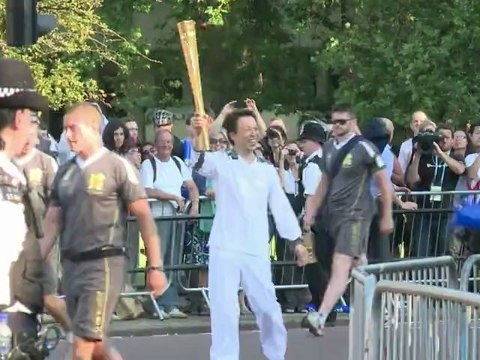 Olympic torch lights up London landmarks