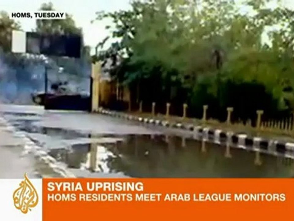 Syrians protest as Arab monitors visit