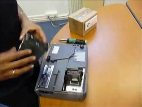 Changing a projector lamp Sanyo LMP90 of a projector Sanyo LC-SB22