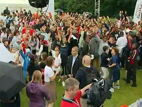 The Wanted and Katy B join Michelle Obama on stage