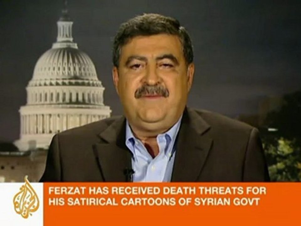 Syrian forces beat up political cartoonist