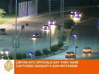 Libya's NTC claims capture of Gaddafi son