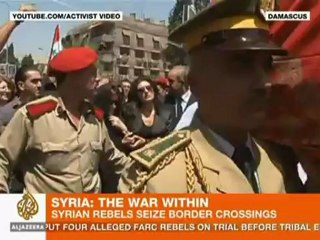 Clashes intensify in Damascus as FSA seizes border crossings