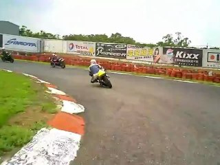 Cute Asian Girl on a Race Track