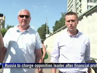 Russian anti-corruption crusader may be charged Tuesday