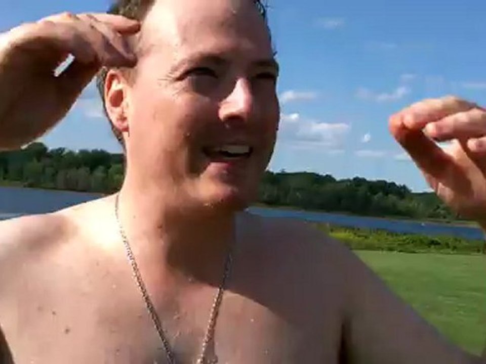 And Again - Going Down The Big Inflatable Slide.  Terrance has even more fun sliding down the inflatable water slide. Amusement ride.