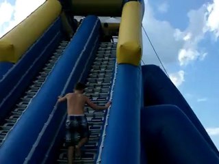 Big Inflatable Slide - Getting ready to go down a water slide. Stoney Creek Metro Park. Carnival ride.